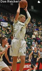 Senior forward Emilie Hesseldal grabs a rebound vs. Nevada