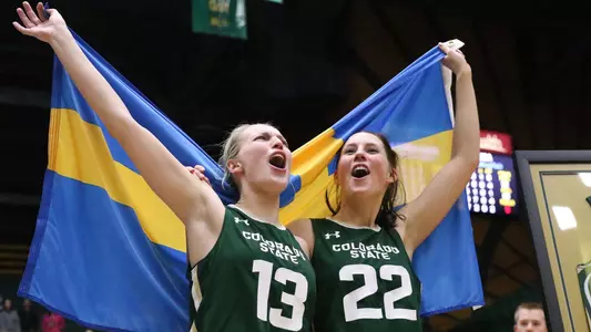 Nystrom, Ellen and Gustavsson, Elin with Sweden flag (WBB - 3/3/17)