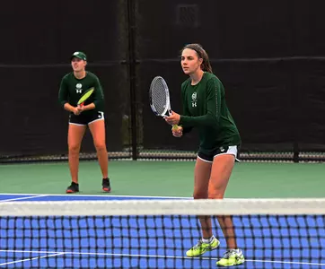 Emily Luetschwager and Stella Cliffe in doubles play
