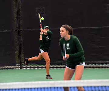 Emily Luetschwager and Stella Cliffe in doubles play