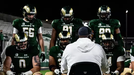 Defensive line huddle