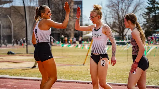 Lexie Keller and Sadie Tunnell High Five