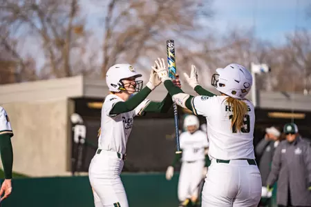 Brooke Bohlender high fives Kyra Smith