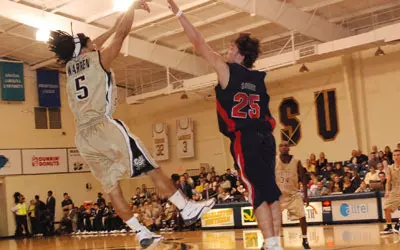 Warren Breaks School Record Despite 80-95 Loss vs. Flames Image