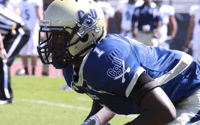 Bucs Can't Overcome Slow Start, Fall to Wesley 32-20 Image