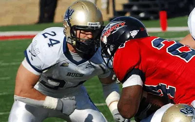 Bucs Fall 33-3 to Spartans in Home Opener Image