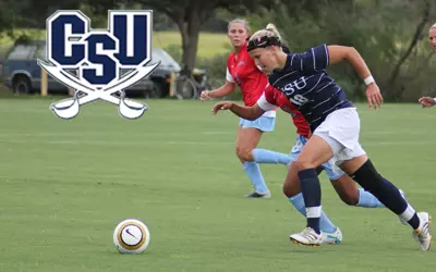 Lady Bucs Drop Hard Fought Conference Opener Image