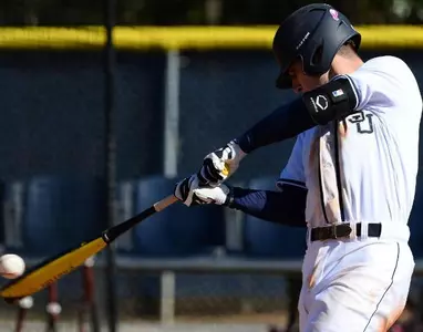 Bucs drop series finale at Coastal, 8-2; Tomasovich extends hit streak to 23 games Image
