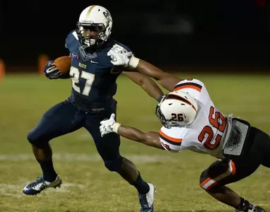 Ground game, defense, power Bucs over Campbell, 34-10 Image