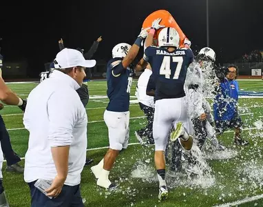Bucs down No. 1 Coastal, 33-25, to gain sole possession of top spot in Big South Image