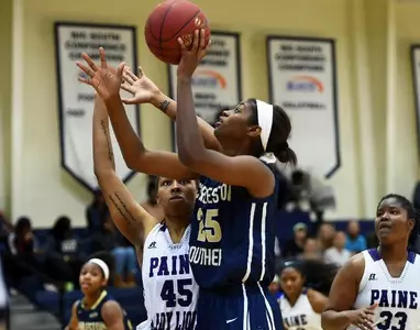 Maximilien's double-double powers Buccaneers past Warner, 73-53 Image