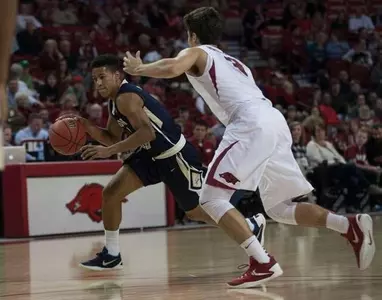 Bucs can't overcome Arkansas's hot shooting in 93-75 loss Image