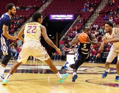 3-Point Prowess: Nimley and Saunders not shy to shoot it Image