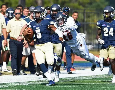 Bucs coast by Bucknell, 49-28, for fourth straight win Image