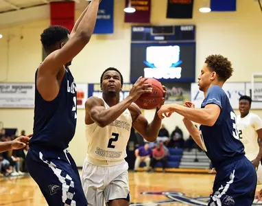 Bucs battle but fall to High Point, 72-69, in overtime Image