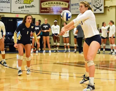 Bucs fall in straight sets to Radford Image