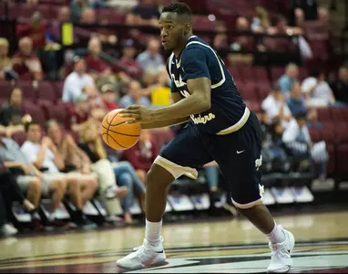 Bucs roll from start to finish in 102-58 win over Johnson & Wales Image