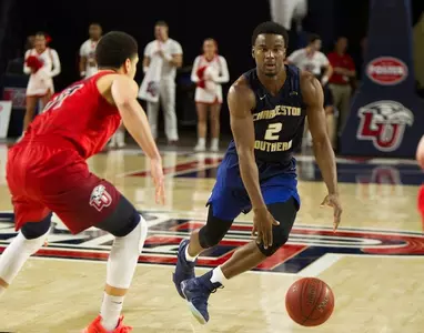 Mitchell keys spirited comeback bid in 76-69 loss at first-place Liberty Image