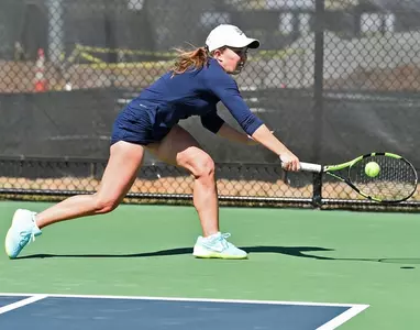 Bucs withstand tough test from Emory in 12th consecutive win Image