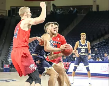 Defense and three-point shooting help Liberty pull away from CSU, 70-53 Image