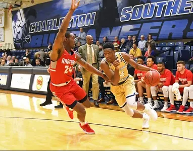 Bucs rally late before Radford holds on, 64-61 Image