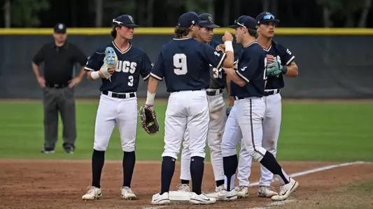Huddle before taking field vs. Kansas