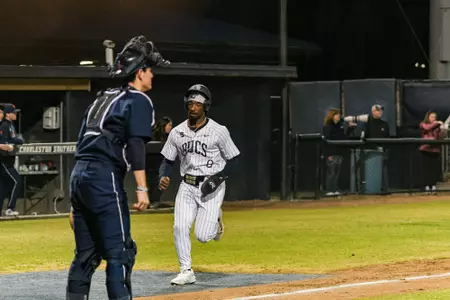 Charleston, S.C. — Charleston Southern outfielder Tyler Wright (0) scores in the bottom of the 8th in Division 1 men’s baseball action between Charleston Southern University and Bucknell University on February 13, 2026, at Charleston Singleton Baseball Complex.
(Mandatory Credit: Arthur Ellis Photography)