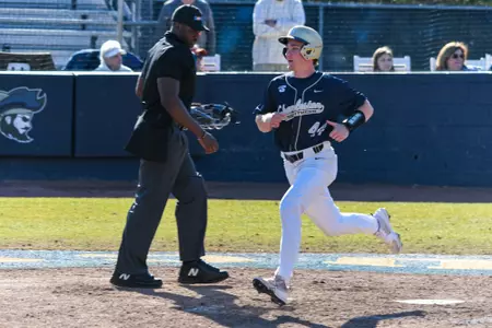Charleston, S.C. — Charleston Southern outfielder Michael Rogers (44) scores a run in Division 1 men’s baseball action between Charleston Southern University and Bucknell University on February 14, 2026, at Charleston Singleton Baseball Complex.
(Mandatory Credit: Arthur Ellis Photography)
