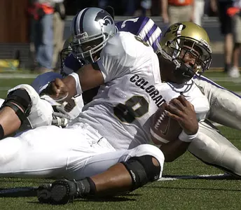 Colorado tailback Daniel Jolly (8) rolls