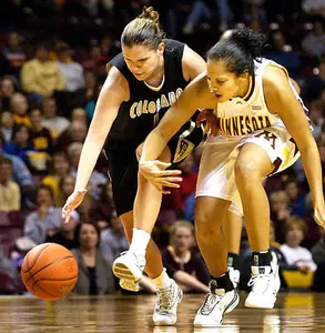 Minnesota's Shannon Bolden, right, and