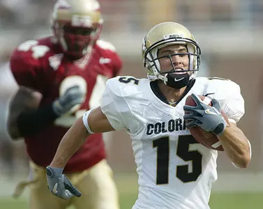 Colorado receiver Jeremy Bloom runs away