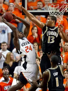 BUFFS DROP CLOSE ONE ON THE ROAD