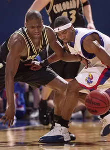 Colorado guard Jayson Obazuaye tries to