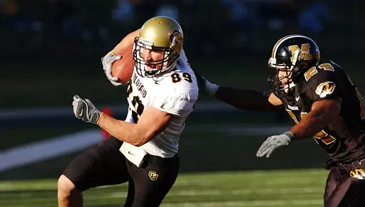 Colorado's Joe Klopfenstein (89) eludes