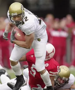 Colorado's Bobby Purify (42) carries the
