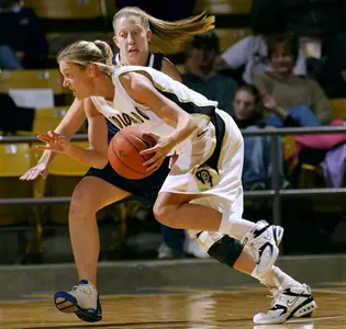 Colorado guard Whitney Law, front,