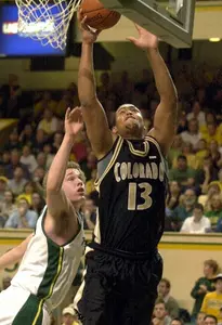 Colorado's David Harrison (13) shoots