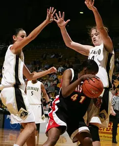 Texas Tech center LaToya Davis, center,