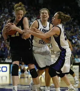 Colorado's Kara Richards (44) grabs a