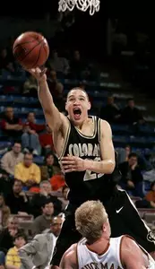 Colorado guard Richard Roby, back, gets