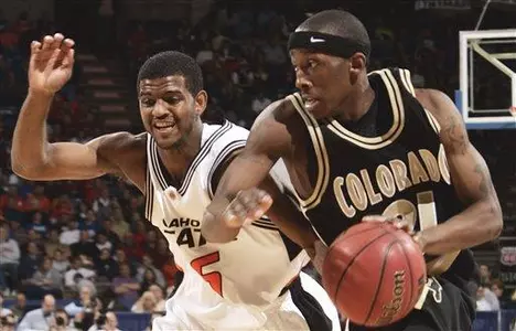 Oklahoma State's John Lucas, left, and