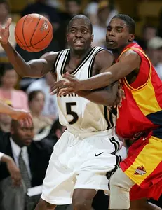 Colorado guard Jason Obazuaye, left,