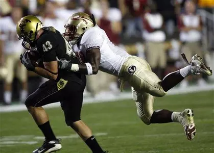 Colorado fullback Samson Jagoras, left,
