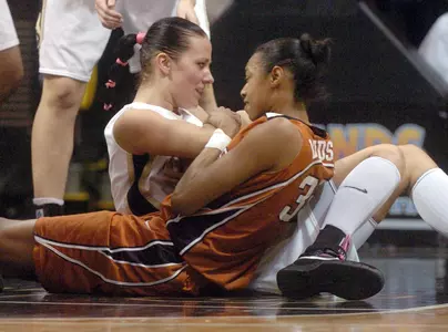 Smith's 26 Paces Buffs Over Texas