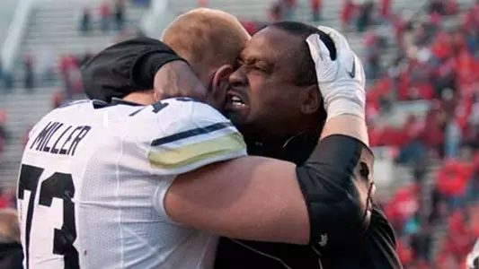 Jon Embree and Ryan Miller