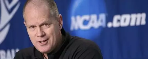 Colorado head coach Tad Boyle answers a