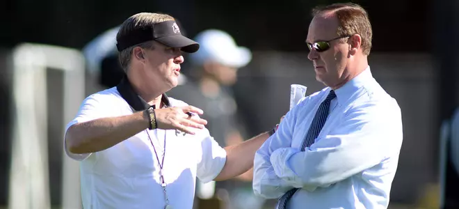 Mike-MacIntyre-Rick-George.jpg