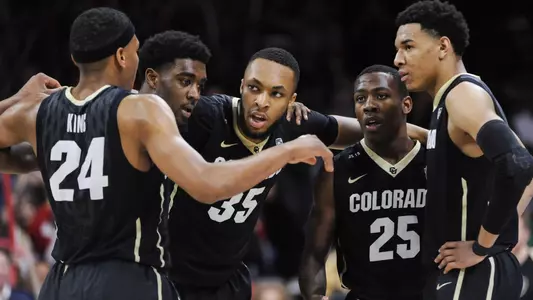 CU players huddle