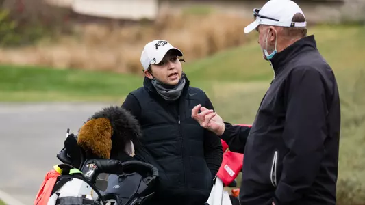 Malak Bouraeda and Associate Head Coach Brent Franklin