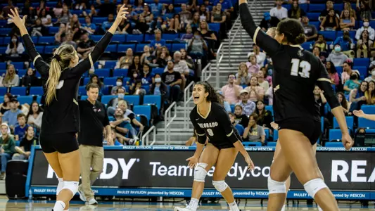 Buffs cheering after winning a point